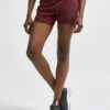 Craft Women's Advance Essence 2-IN-1 Shorts - Truffle (1910722-439000) -Sports Equipment 1910722 439000 ADVEssence2 in 1ShortsW Closeup1 Preview